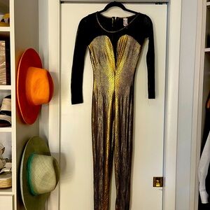 Bowiesque gold and sheer jumpsuit. Worn once.
